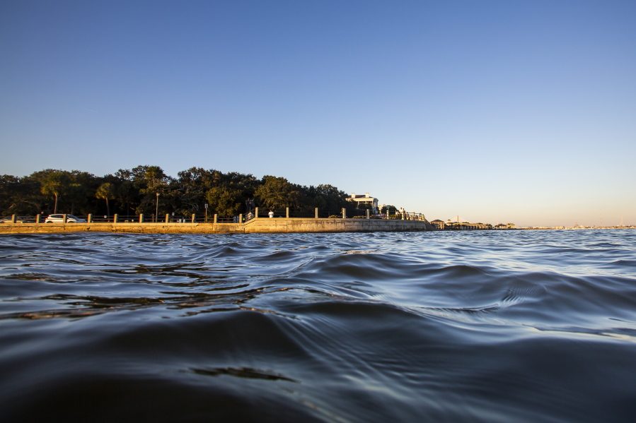High tide laps against the sea wall at The Battery in Charleston, S.C., in November 2020.