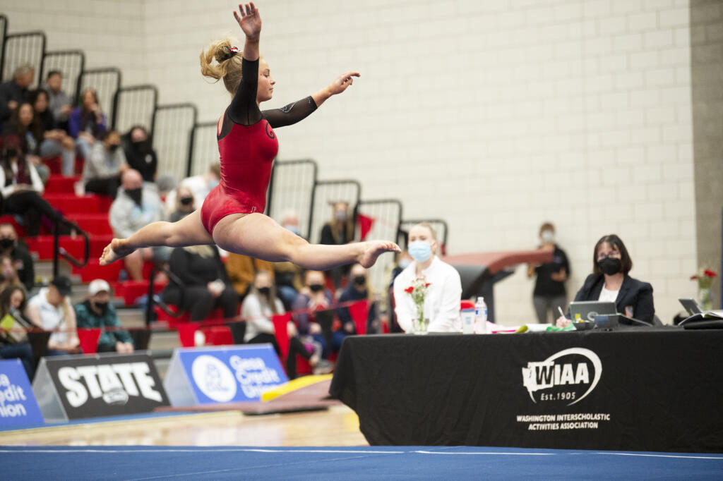 Camas sophomore Hallie Kempf performs her floor exercise routine at the 4A state gymnastics meet at Sammamish High School in Bellevue on Saturday, Feb. 26, 2022.