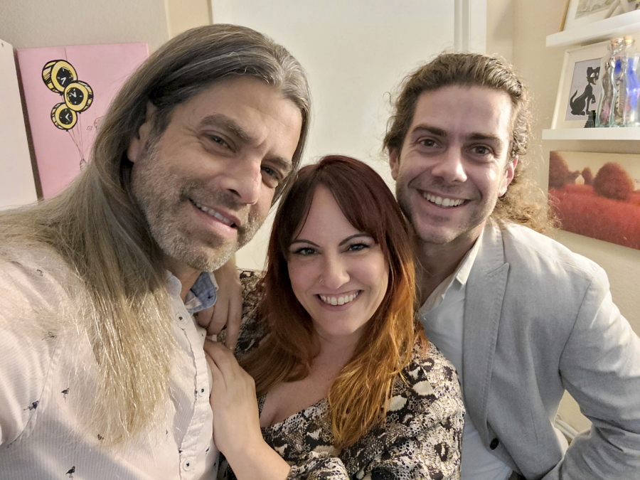 This image provided by Ryan Cohen shows, from left, Ryan Cohen, his wife, Emily Taffel, and Taffel's former boyfriend, Sam Rubman, on Feb. 3, 2022, in Coral Springs, Fla. In the era of intense cybersecurity and calls for multifactor lockdown of all things digital, the three share several logins to streaming services.
