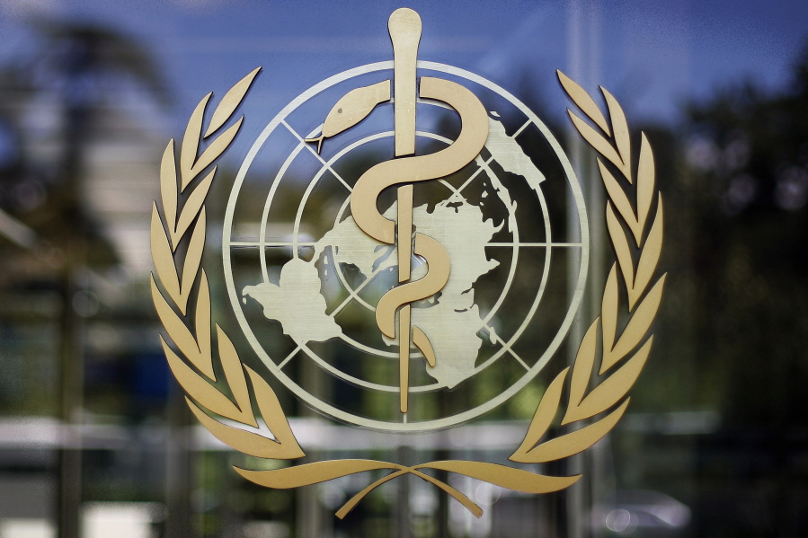 FILE - The logo of the World Health Organization is seen at the WHO headquarters in Geneva, Switzerland, June 11, 2009. The World Health Organization chief on Tuesday, Feb. 1, 2022 says 90 million cases of coronavirus have been reported since the omicron variant was first identified 10 weeks ago, amounting to more than in all of 2020, the first year of the COVID-19 pandemic.