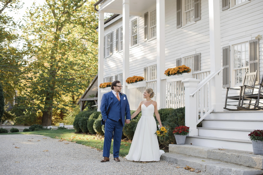 Shelley Kapitulik-Jaye and Stephen Jaye have a quiet moment on their wedding day, Oct. 20, in Norwalk, Conn. The two wed on a Wednesday, tapping into a trend of couples choosing weekdays for their weddings, by either choice or necessity.