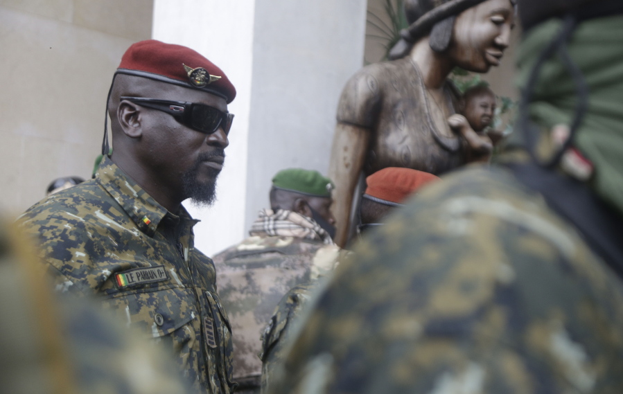 FILE - Guinea's Junta President Col. Mamady Doumbouya, leaves a meeting with an ECOWAS delegation in Conakry, Guinea, Sept. 10, 2021. West Africa is grappling with a wave of military coups over the past 18 months that has some wondering which country could be next.