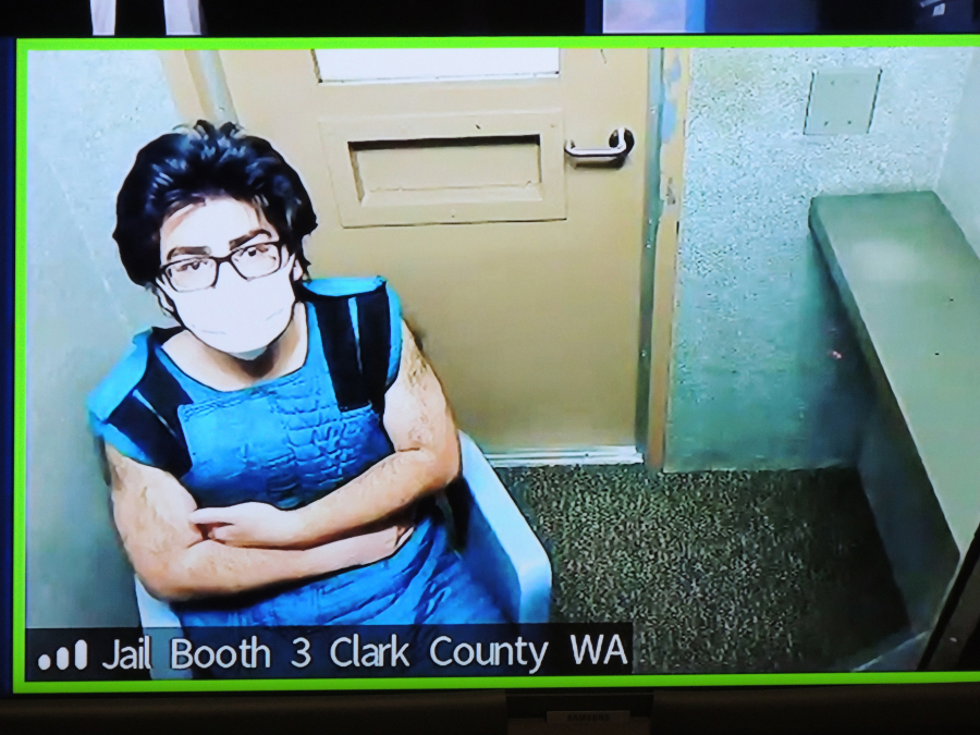 Julio Cesar Segura, 20, of Yakima appears Jan. 31 in Clark County Superior Court in connection with an armed robbery and death of off-duty Vancouver police Officer Donald Sahota, who was mistakenly shot by a Clark County sheriff's deputy during a manhunt for Segura.