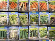 Vegetable seeds line the shelves of Home Depot, March 1, 2022. People in Washington state can use food stamps to buy plants and seeds, in addition to food.