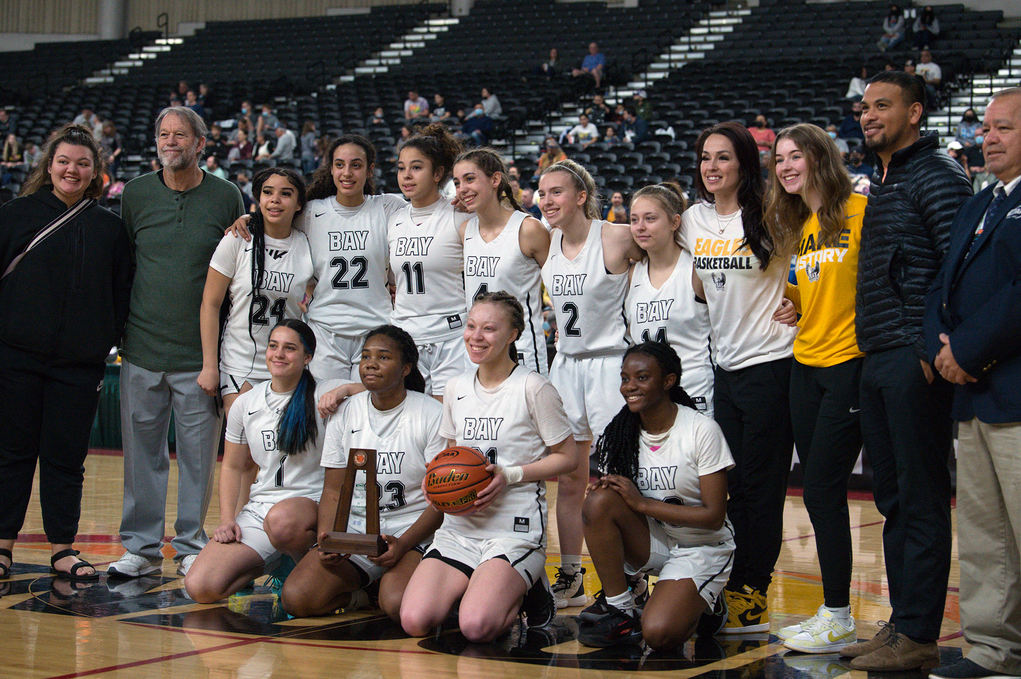 The Hudson’s Bay girls basketball team poses with the sixth-place trophy at the Class 2A state tournament on Saturday, March 5, 2022 in Yakima.
