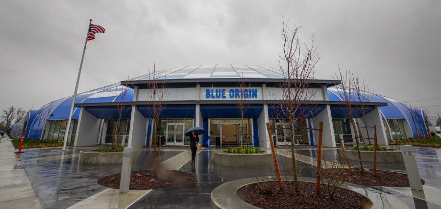 The space industry around Puget Sound is booming, in part because of the rapid growth of Jeff Bezos-founded Blue Origin. After a grand opening ceremony, a woman walks away from Blue Origin???s new Kent headquarters, the O'Neill building, Monday, Jan. 6, 2020, in Washington. (Ellen M.