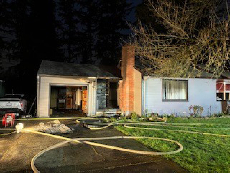 A single-story house in the Vancouver Heights neighborhood caught fire early Wednesday morning. Firefighters rescued a puppy that they found hiding under a bed during the fire.