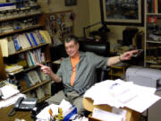 Syndicated columnist L.M. Boyd is shown in his office, located in the basement of his house, in Seattle , date unknown. After entertaining readers with interesting bits of trivia for 40 years, Boyd will retire after his last column runs on Saturday, Dec. 30, 2000.