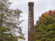The Historic Trust has received a demolition permit to tear down the landmark Providence Academy smokestack, but it must wait 90 days to see if $3.5 million can be raised to preserve the structure instead.