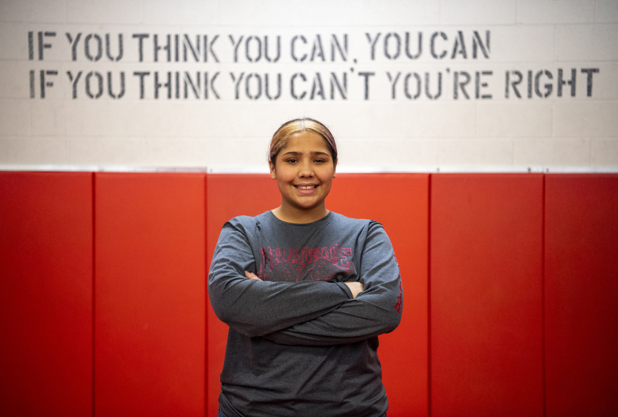 Prairie freshman Faith Tarrant stands in the wrestling room of Prairie High School. Tarrant recently won the 235-pound state championship.