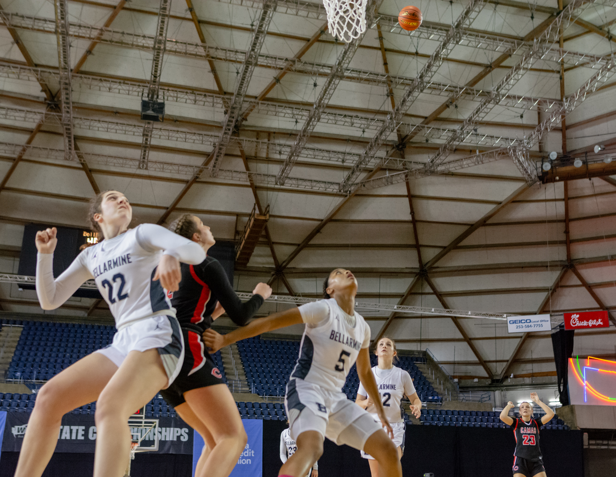 Players fight for position as Camas' Riley Sanz's 3-pointer comes up short in the 4A State Girls Basketball tournament on Wednesday, March 2, 2022, at the Tacoma Dome.