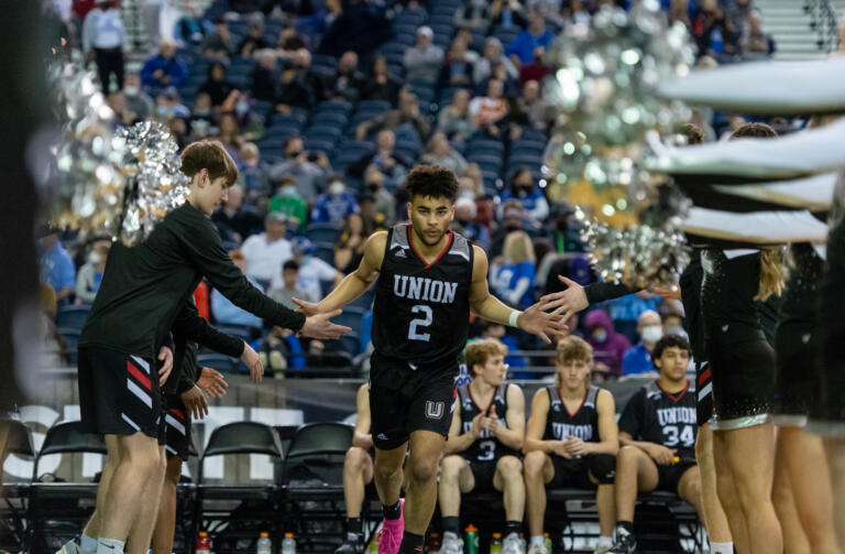 Union's Jamison Limbrick is introduced before a 4A State Boys Basketball semifinal on  Friday, March 4, 2022, at the Tacoma Dome.