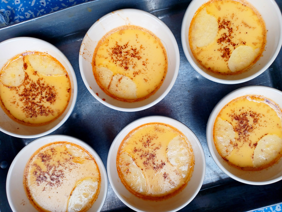 This not-too-sweet custard is made with honey and cooked in ramekins with a sprinkle of nutmeg.