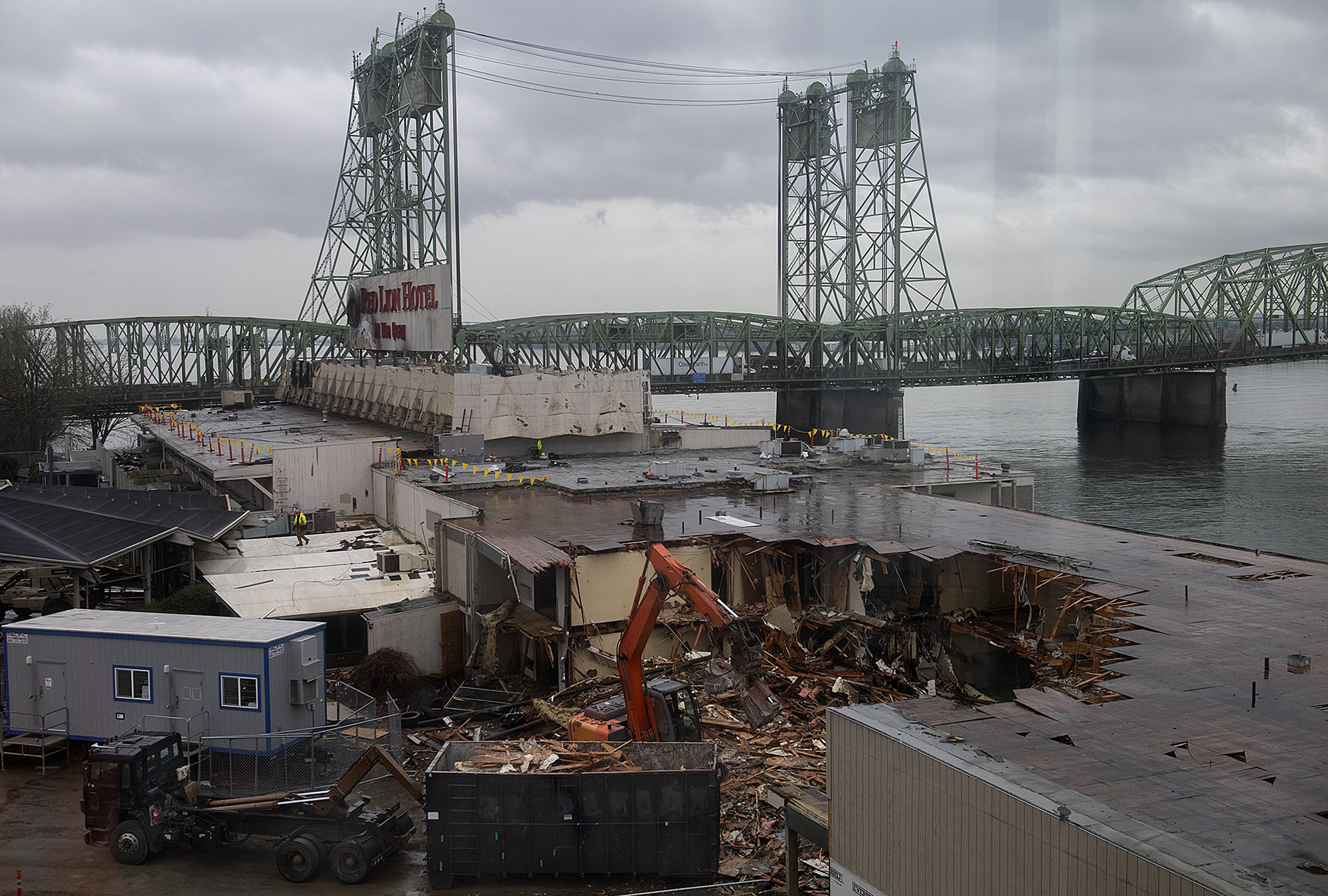 Demolition crews tear into a section of the former Red Lion at the Quay on Tuesday morning, March 8, 2022.