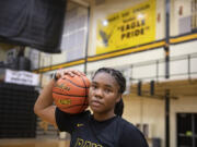 Hudson's Bay senior point guard Aniyah Hampton, the All-Region girls basketball player of the year, takes a break from classes at Hudson's Bay High School on Monday afternoon, March 14, 2022.