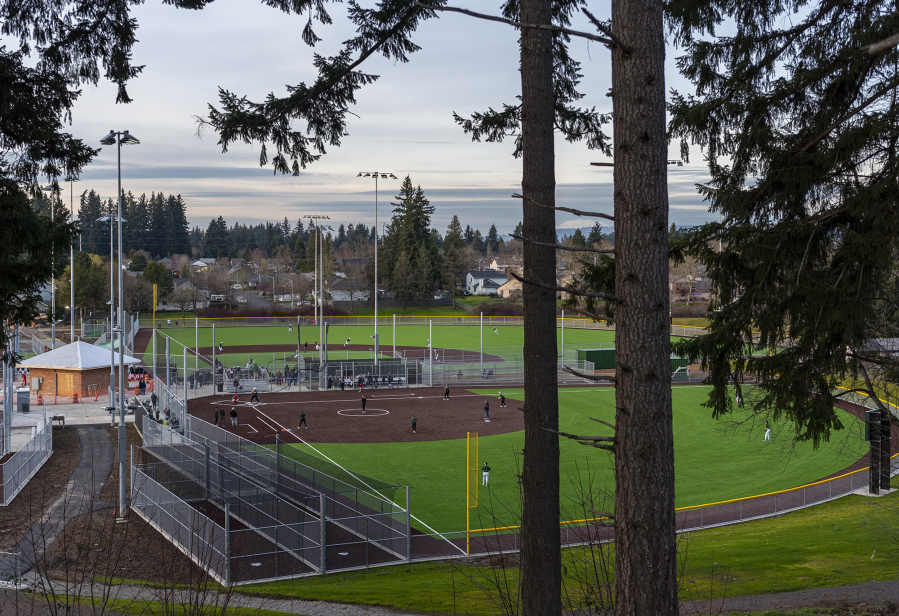 Softball and baseball games happen on new turf fields Friday, March 11, 2022, at the Evergreen Sports Complex.
