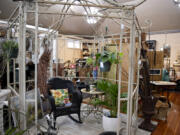 An iron garden gazebo is one of the many items for sale at Ridgefield Mercantile, which aspires to appeal to those with varying tastes and styles.