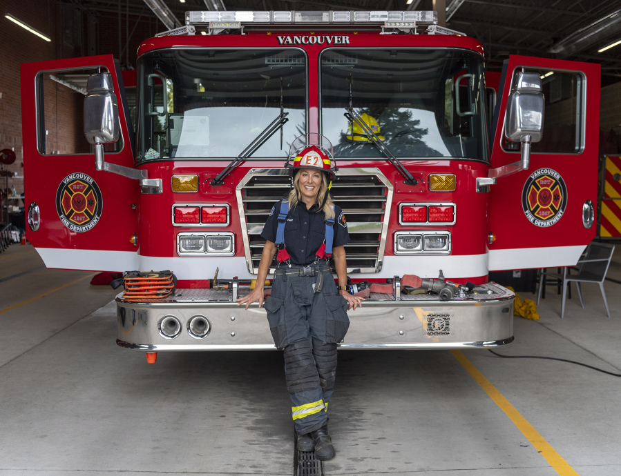 Vancouver Fire Department Capt. Heidi Parr stands in front of her engine at Fire Station 2. Parr leads the first all-female crew in the department's 150-year history. The hope is that this crew formation becomes less unusual as the department diversifies its workforce, Fire Chief Brennan Blue said. Out of the Vancouver Fire Department's 178 frontline firefighters and captains, only 10 are women.
