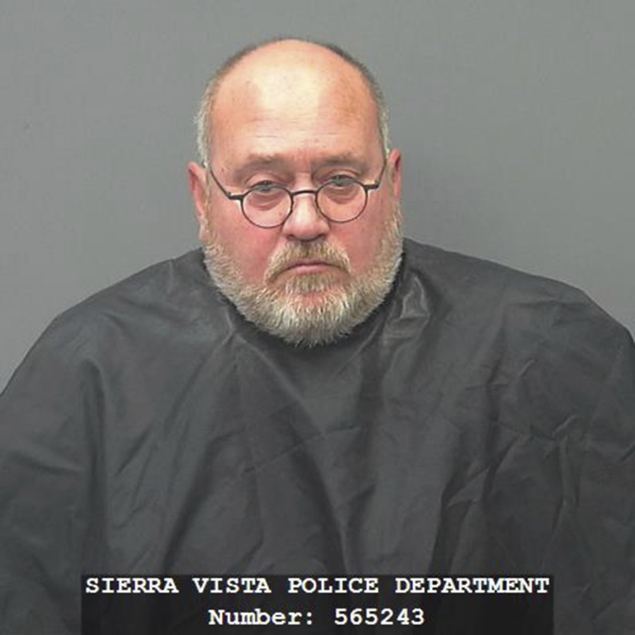 This 2016 photo provided by the Sierra Vista, Ariz., Police Department shows David Frodsham. Frodsham pleaded guilty to sex abuse charges in 2016 and is serving a 17-year sentence. But records reviewed by the AP show that the U.S. Army and the state of Arizona missed or ignored multiple red flags over more than a decade, which allowed Frodsham to allegedly abuse his adopted son and other children for years, all the while putting national security at risk.