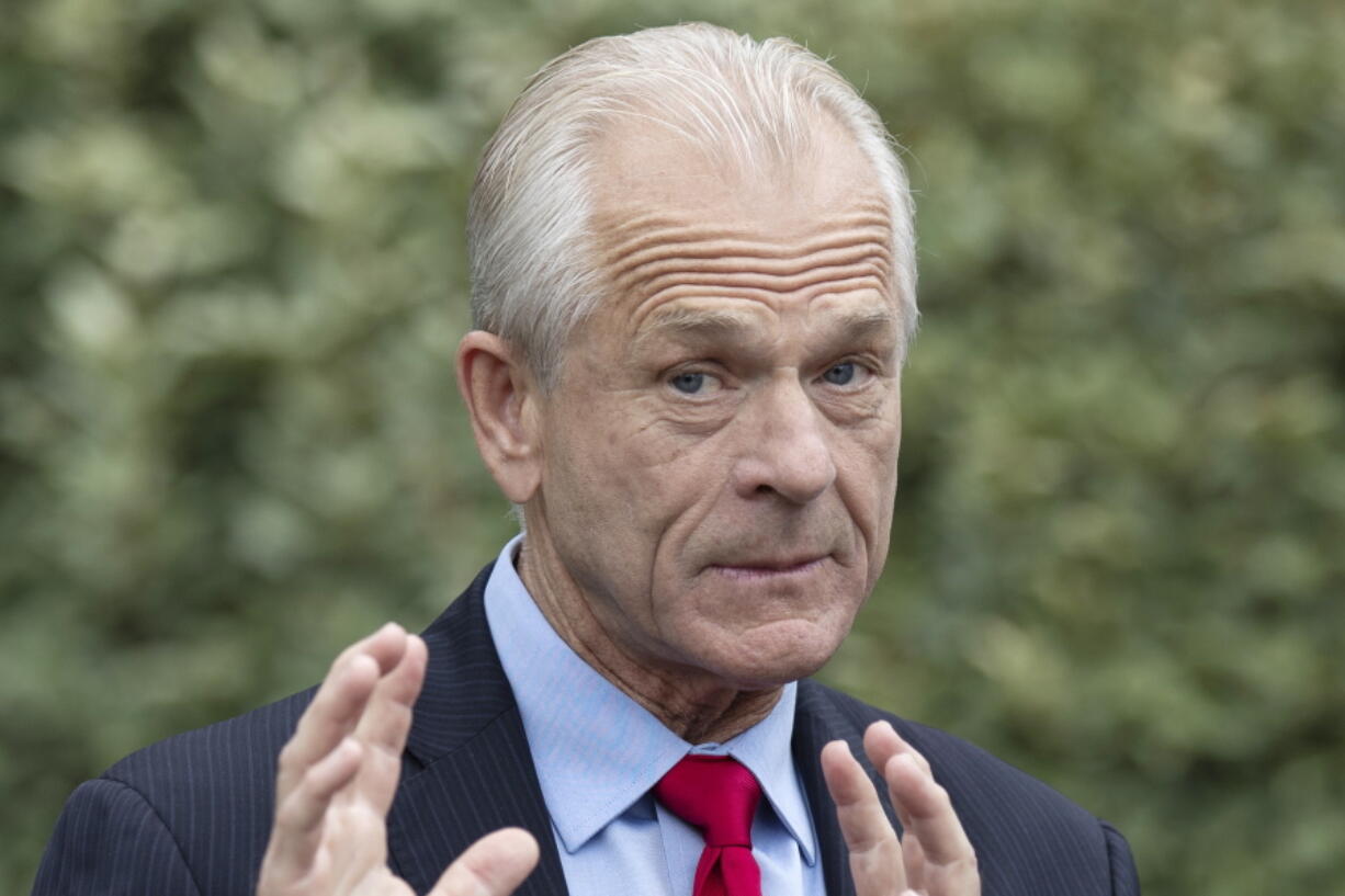 FILE - White House trade adviser Peter Navarro speaks with reporters at the White House, June 18, 2020, in Washington. The House committee investigating the Capitol riot has set a vote for next week to consider contempt of Congress charges for two aides of former President Donald Trump. The committee will meet Monday to discuss whether to recommend referring for potential prosecution Trump's former trade adviser, Peter Navarro, and Dan Scavino, the onetime chief of staff for communications.