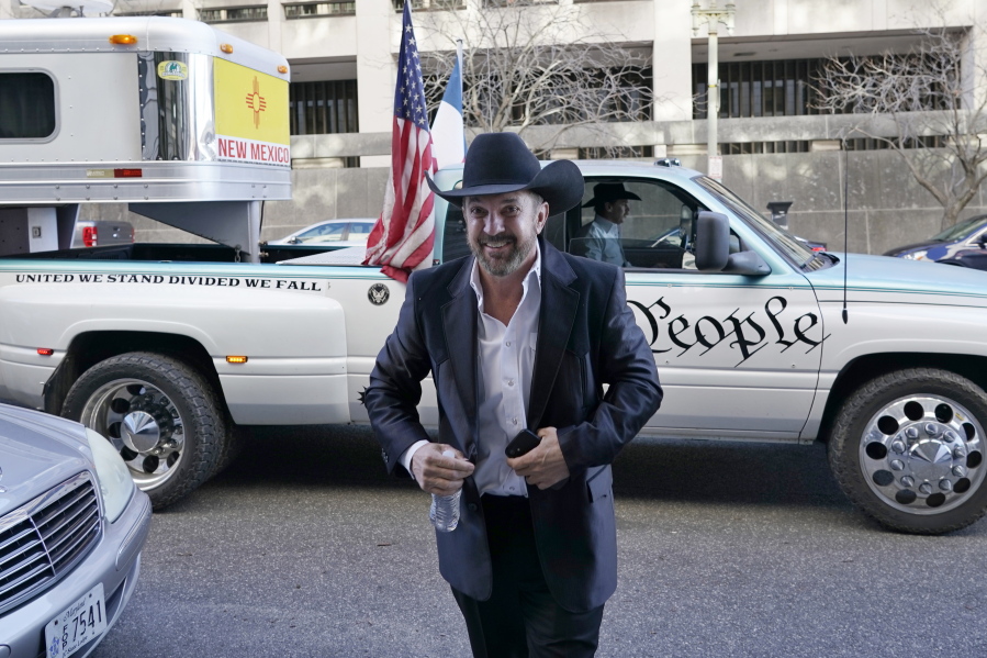 Otero County, New Mexico Commissioner Couy Griffin, arrives at the Federal Court House in Washington, Monday, March 21, 2022. Griffin is charged with illegally entering Capitol grounds the day a pro-Trump mob disrupted certification of Joe Biden's presidential election victory on Jan. 6, 2021.