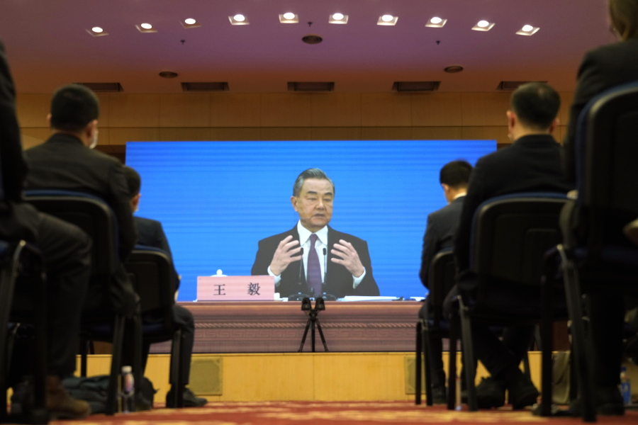 Chinese Foreign Minister Wang Yi speaks during a remote video press conference held on the sidelines of the annual meeting of China's National People's Congress (NPC) in Beijing, Monday, March 7, 2022. China's Foreign Minister on Monday called Russia Beijing's "most important strategic partner," amid its continued refusal to condemn the invasion of Ukraine.