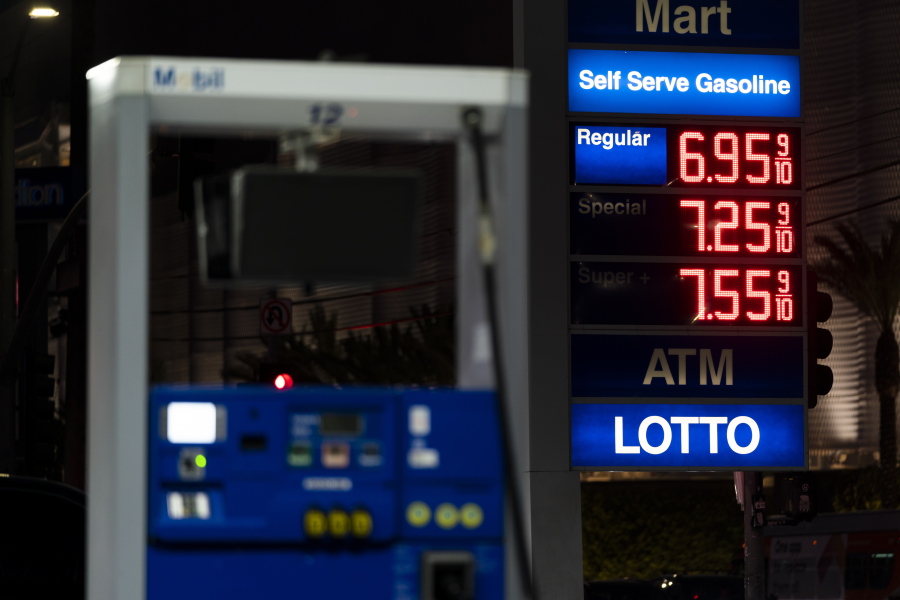 Gas prices are displayed at a Mobil gas station in West Hollywood, Calif., Tuesday, March 8, 2022. The average price for a gallon of gasoline in the U.S. hits a record $4.17 on Tuesday as the country prepares to ban Russian oil imports. (AP Photo/Jae C.