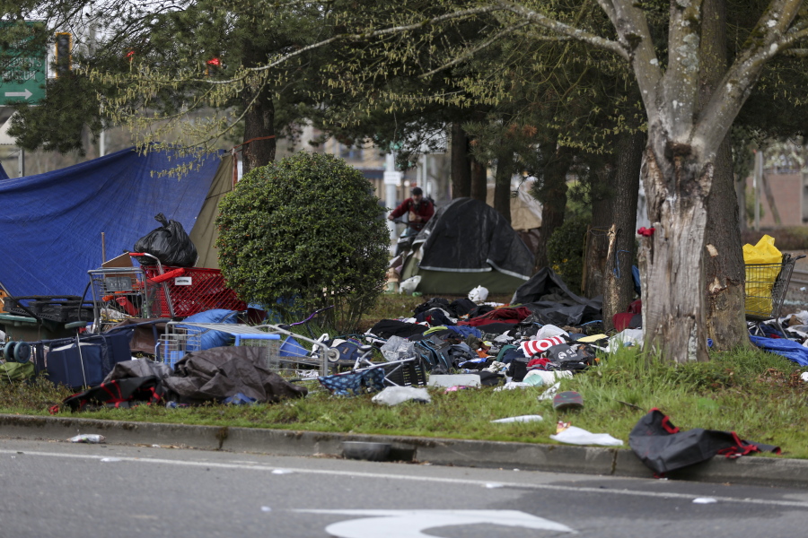A homeless camp is seen after a vehicle crashed into the camp, killing several people, near Front Street Northeast, Sunday, March 27, 2022, in Salem, Ore.
