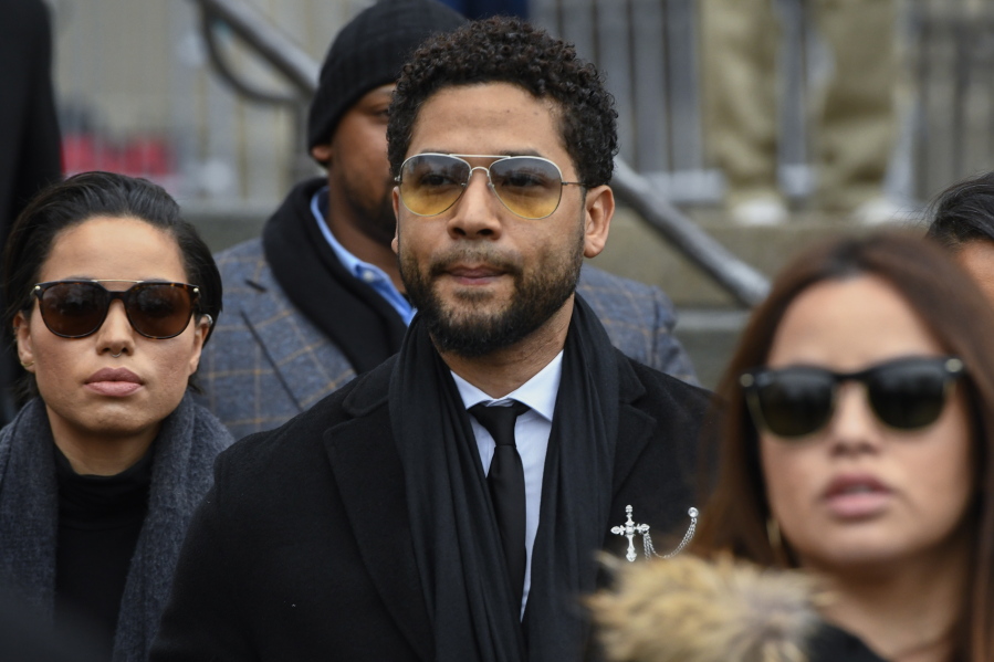 FILE - Former "Empire" actor Jussie Smollett leaves the Leighton Criminal Courthouse in Chicago, Monday Feb. 24, 2020. Smollett is returning to a Chicago courtroom Thursday, March 10, 2022 for sentencing with just two questions hanging over his head: Will he admit that he lied about a racist homophobic attack and will a judge send him to jail?