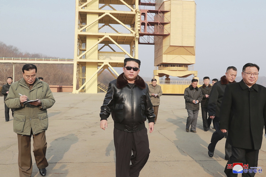 In this undated photo provided by the North Korean government on Friday, March 11, 2022, North Korean leader Kim Jong Un visits the Sohae Satellite Launching Ground in Tongchang-ri, North Korea. Independent journalists were not given access to cover the event depicted in this image distributed by the North Korean government. The content of this image is as provided and cannot be independently verified. Korean language watermark on image as provided by source reads: "KCNA" which is the abbreviation for Korean Central News Agency.