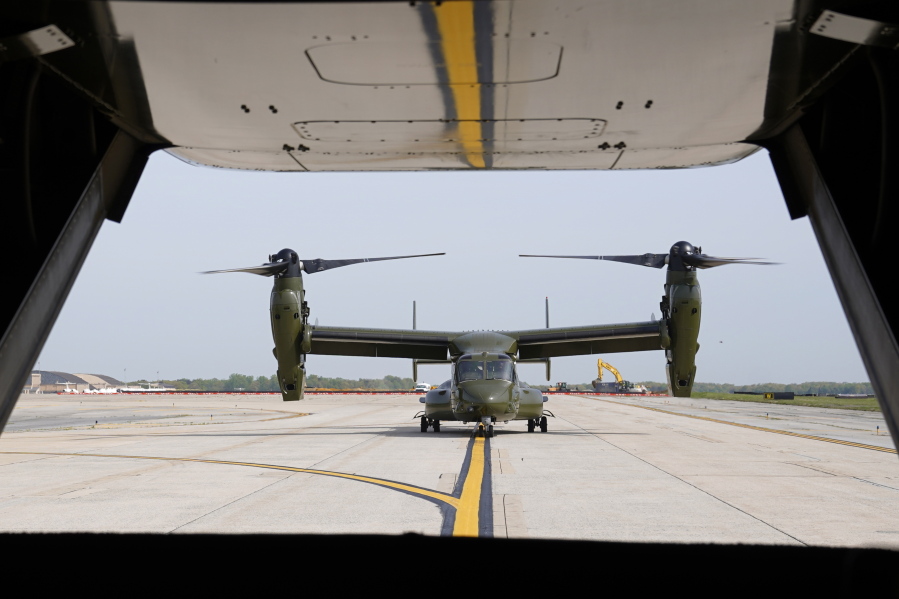 FILE - A U.S. Marine Corps Osprey aircraft taxies behind an Osprey carrying members of the White House press corps at Andrews Air Force Base, Md., on April 24, 2021. Norwegian authorities are searching for a U.S. Marine Corps aircraft that went missing during a training exercise. Norway's military says the Marine Osprey was reported missing Friday night. March 18, 2022, when it did not make a scheduled arrival at the Arctic Circle municipality Bod?.