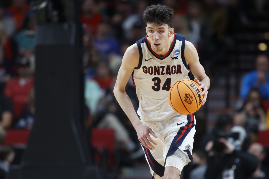 Gonzaga center Chet Holmgren (34) moves the ball against Georgia State during the second half of a first round NCAA college basketball tournament game, Thursday, March 17, 2022, in Portland, Ore.