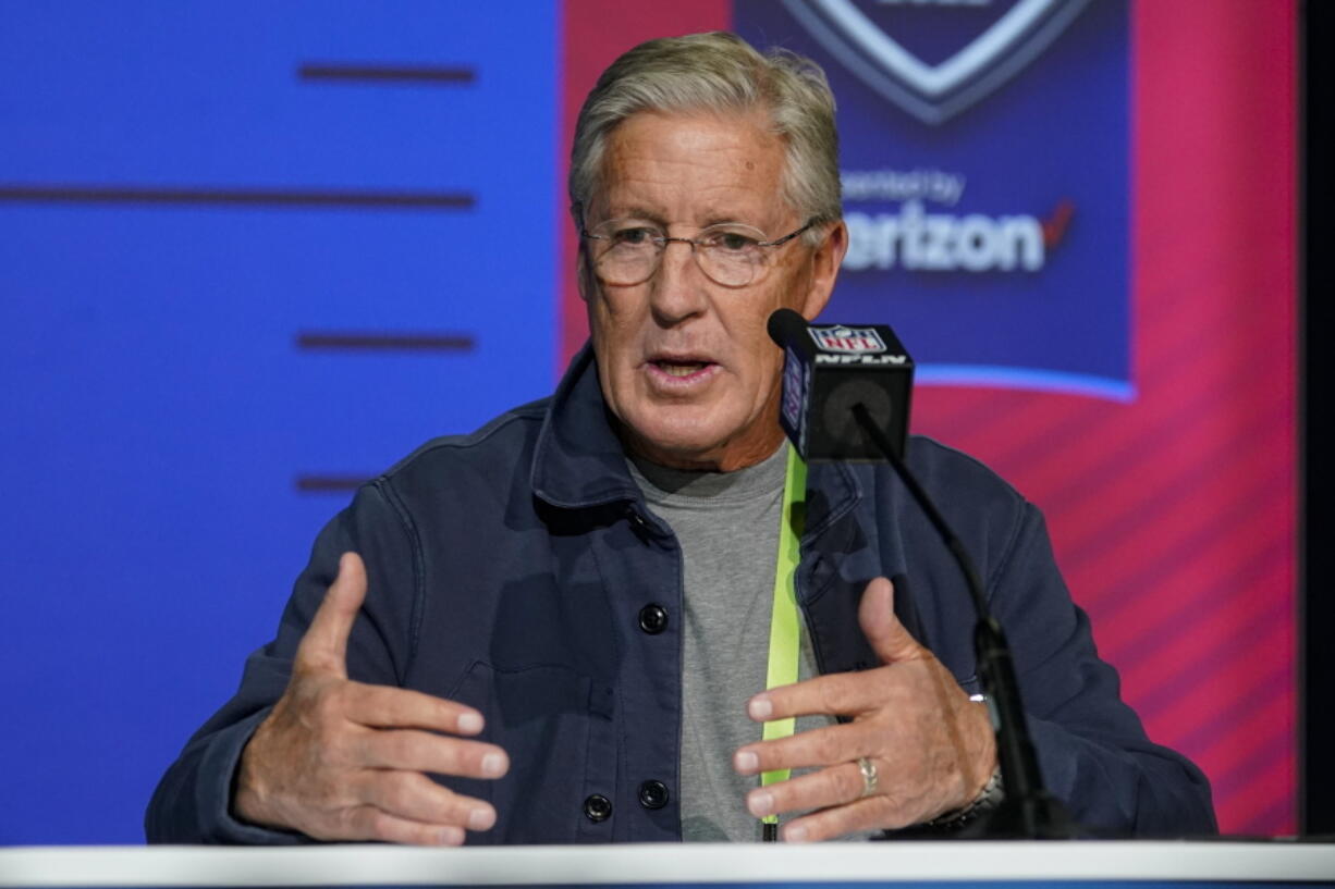 Seattle Seahawks head coach Pete Carroll speaks during a press conference at the NFL football scouting combine in Indianapolis, Wednesday, March 2, 2022.