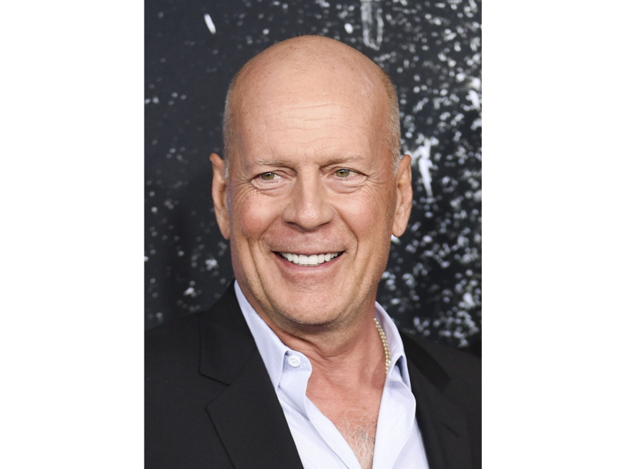 FILE - Actor Bruce Willis appears at the premiere of "Glass" in New York on Jan. 15, 2019. Wills is stepping away from acting after a diagnosis of aphasia, a condition that causes the loss of the ability to understand or express speech, his family announced Wednesday. In a statement posted on Willis' Instagram page, the 67-year-old actor's family said Willis was recently diagnosed with aphasia and that it is impacting his cognitive abilities.