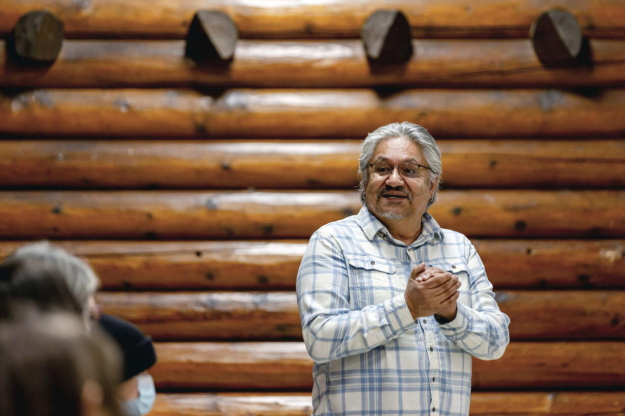 Lac La Croix First Nation speaker Gordon Jourdain, whose Ojibwe name is Maajiigwaneyaash, engages in an annual traditional Ojibwe storytelling gathering Feb. 24 at the Log Community Building in Grand Portage, Minn. Oral storytelling plays a crucial role in Ojibwe spiritual tradition, as is the case with other Native American peoples. Believed to be in itself a gift from the Creator, the recounting of tribal lore helps keep cultural worldviews, ethical teachings and religious experiences alive across generations.