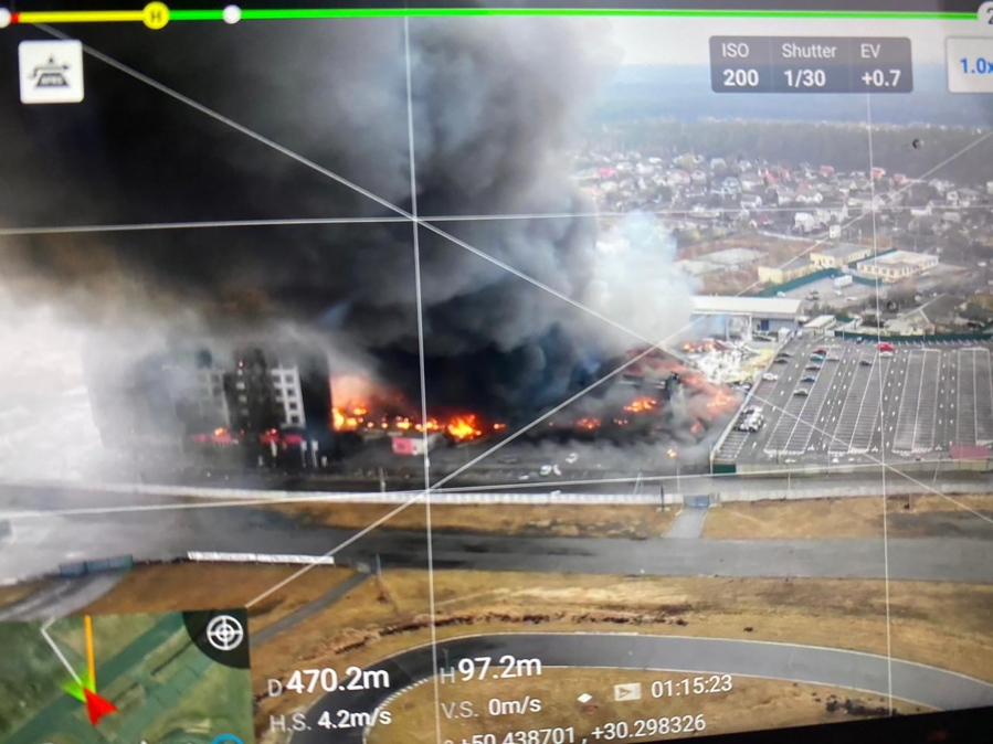 This 2022 aerial image provided by Ukrainian security forces, taken by a drone and shown on a screen, shows a blown-up building near the outskirts of Kyiv, Ukraine. The exact date and time of the image are unknown. In better times, Ukrainian drone enthusiasts flew their gadgets into the sky to photograph weddings, fertilize soybean fields or race other drones for fun. Now some are risking their lives by forming a volunteer drone force to help their country repel the Russian invasion.