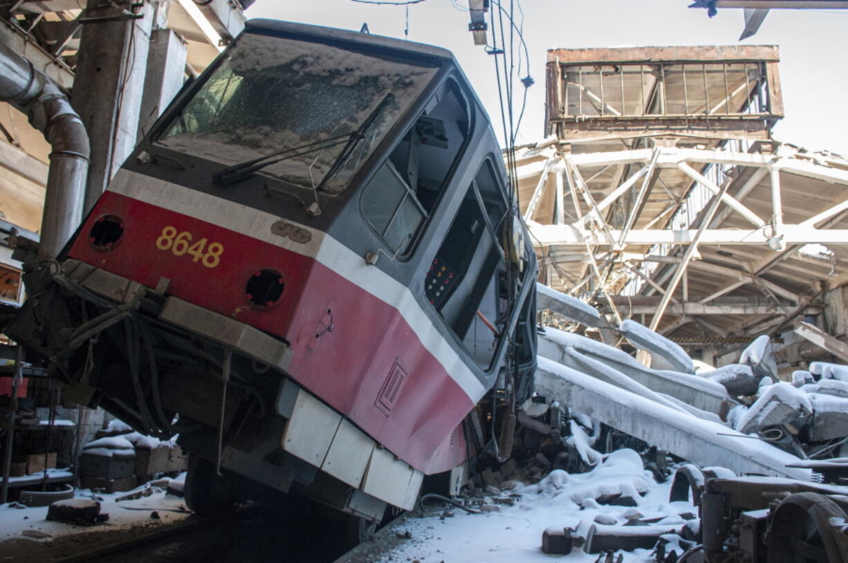 A view of a destroyed tram damaged by shelling, at a tram depot, in Kharkiv, Ukraine, Saturday, March 12, 2022.