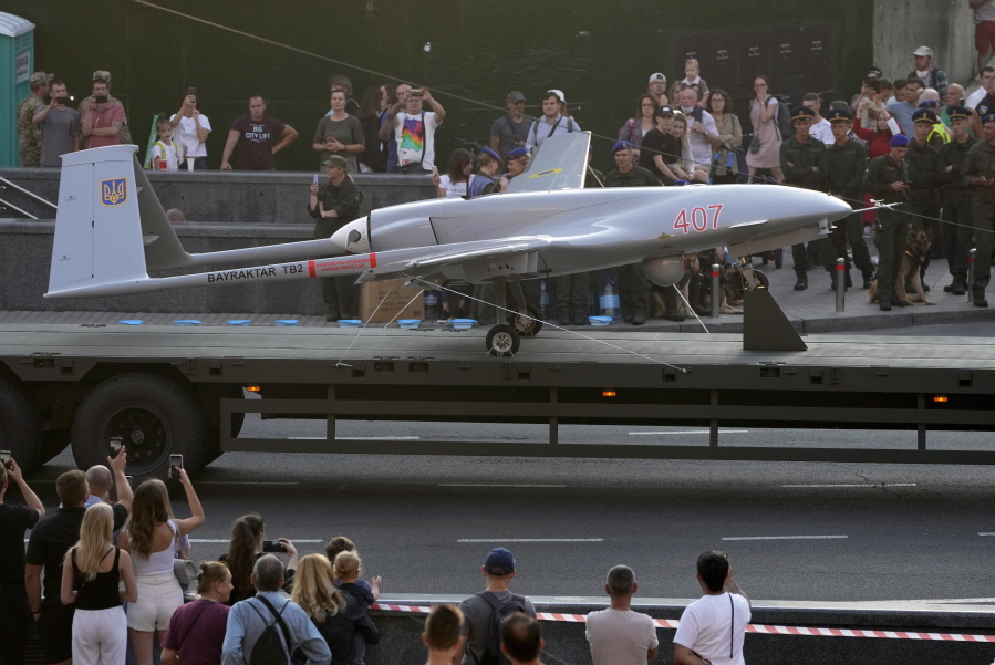 FILE - A Turkish-made Bayraktar TB2 drone is displayed during a rehearsal of a military parade dedicated to Independence Day in Kyiv, Ukraine, Aug. 20, 2021. The drones, which carry lightweight, laser-guided bombs, have carried out unexpectedly successful attacks in the early stages of Ukraine's conflict with Russia.