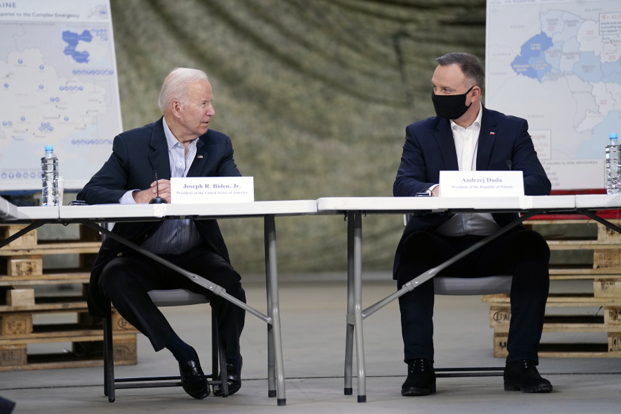 President Joe Biden and Polish President Andrzej Duda participate in a roundtable on the humanitarian response to the Russian invasion of Ukraine, Friday, March 25, 2022, in Jasionka, Poland.