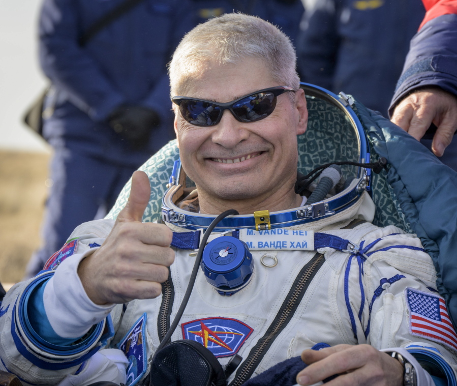 NASA astronaut Mark Vande Hei gives the thumbs up outside the Soyuz MS-19 spacecraft after he landed with Russian cosmonauts Anton Shkaplerov and Pyotr Dubrov in a remote area near the town of Zhezkazgan, Kazakhstan on Wednesday, March 30, 2022. Vande Hei and Dubrov are returning to Earth after logging 355 days in space as members of Expeditions 64-66 aboard the International Space Station.