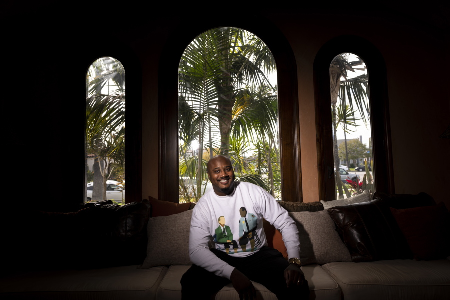 Brandon Brown poses for photos in Los Angeles, Thursday, March 25, 2021. Brown, a former history teacher and assistant high school principal, is now a Billboard-charting educational rapper who performs around the U.S. He founded School Yard Rap, a California-based company that produces music about historical Black, Latino and Indigenous people often not found in traditional textbooks. (AP Photo/Jae C.