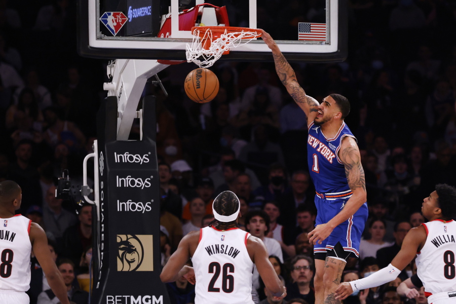 New York Knicks' Obi Toppin (1) dunks against the Portland Trail Blazers during the second quarter of an NBA basketball game Wednesday, March 16, 2022, in New York.