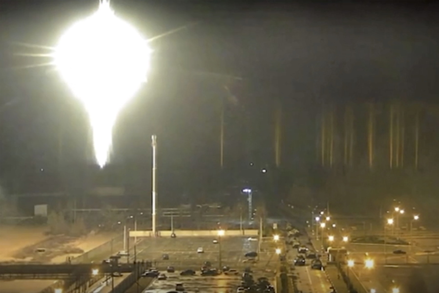 This image made from a video released by Zaporizhzhia nuclear power plant shows bright flaring object landing in grounds of the nuclear plant in Enerhodar, Ukraine Friday, March 4, 2022. Russian forces shelled Europe's largest nuclear plant early Friday, sparking a fire as they pressed their attack on a crucial energy-producing Ukrainian city and gained ground in their bid to cut off the country from the sea.
