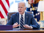 FILE - President Joe Biden speaks before signing the American Rescue Plan, a coronavirus relief package, in the Oval Office of the White House, March 11, 2021, in Washington.It's been one year since President Joe Biden signed into law the American Rescue Plan. The $1.9 trillion package of relief measures was designed to fight the coronavirus pandemic and help the economy rebound.