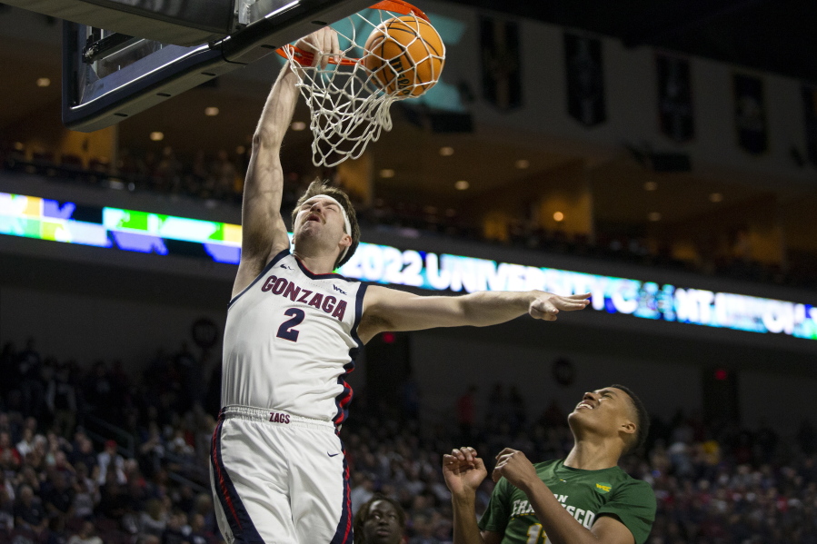 Gonzaga forward Drew Timme (2) shoots against San Francisco forward Patrick Tape (11) during the first half of West Coast Conference semifinal game on Monday.
