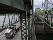 A truck driver travels northbound on the Interstate 5 Bridge in August 2021. Washington's hefty bill, Move Ahead Washington, secured $1 billion in funding for the I-5 Bridge replacement project.