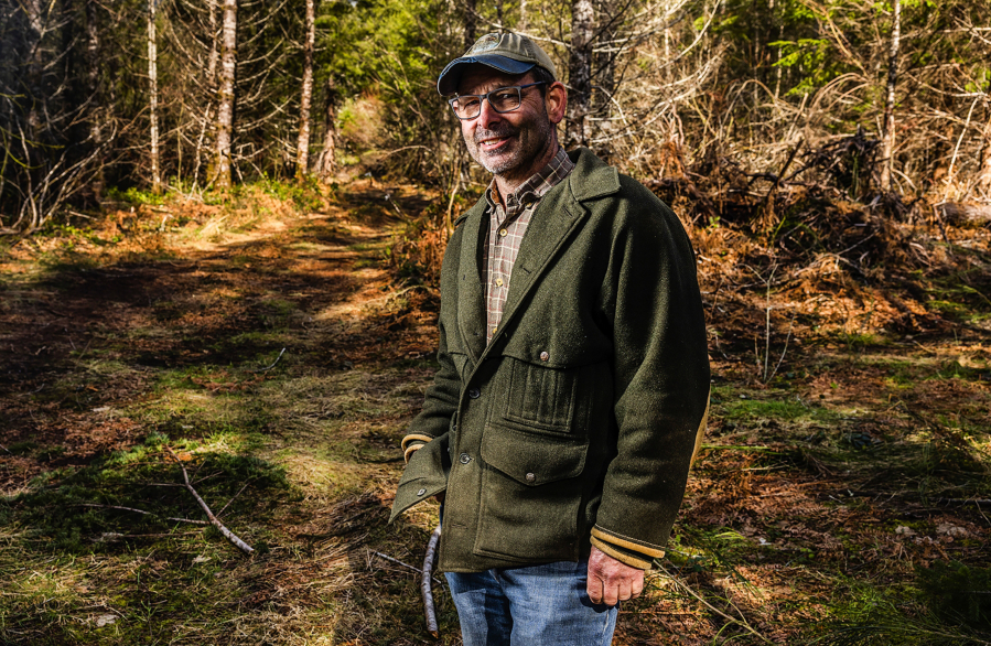 Mayor Dan Rankin stands in the woods where the proposed Darrington Wood Innovation Center, a $120 million plan to develop a manufacturing hub for cross-laminated timber, would be built.