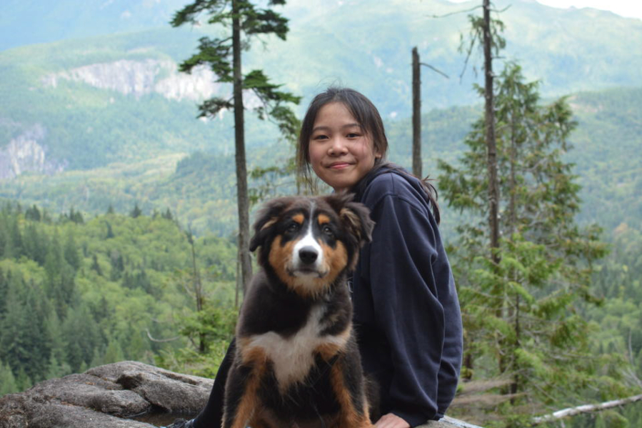 International student Cherry Winarto goes on a hike with her dog, Milo, at Lake Serene. She likes hiking in her leisure time with her sisters and friends to keep her spirits up throughout these challenging times.