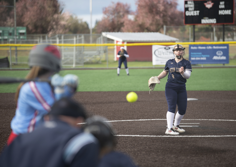 Seton Catholic's Katy Kutch fires a pitch against Mark Morris on Thursday at Fort Vancouver High School.