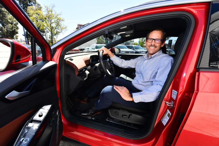Sunnyvale Volkswagen dealership owner Dietmar Burkhardt Jr. inside a 2021 ID.4 AWD Pro S in Sunnyvale, California, on Friday, March 25, 2022. The ID.4 is Volkswagen???s new electric compact SUV.